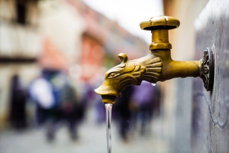 picture of golden water tap hydrant pipe be of copper . drawing on record using white mini studio . very interesting although the tap pipeの写真素材