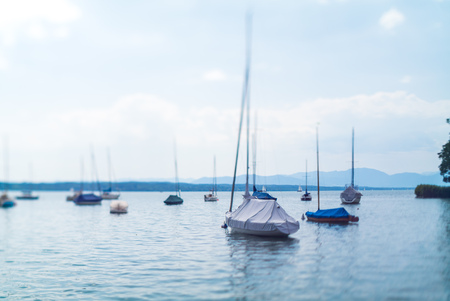 Small sailing boats on lake, Switzerland selective focusの写真素材