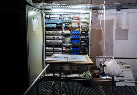 Low-voltage cabinet. Uninterrupted power. Electrical power in cellar basementの写真素材