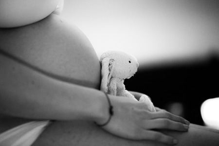 Belly of pregnant woman black white nine month Pregnant girlの写真素材