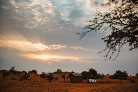 Tent located on the roof of a pickup 4x4 car in a desert camp Ranchの写真素材