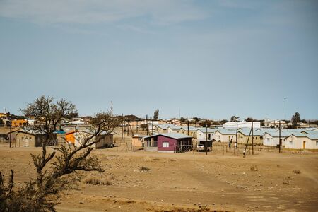 Village for agriculture workers Namibian desert panorama with fields and mountainsの写真素材