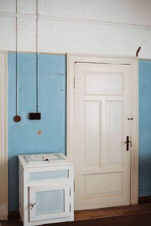 Interior of a colonial living room with table and furnituresの写真素材