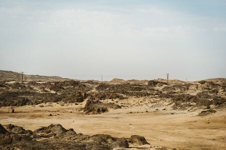 View of Namibia desert with transmission towers near South Africaの写真素材