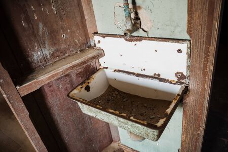 concept photo for bathroom renovation - old destroyed bathing roomの写真素材