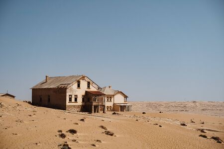 wideangle view of desert ghost town of Kolmanskop Luderitz in Namibiaの写真素材