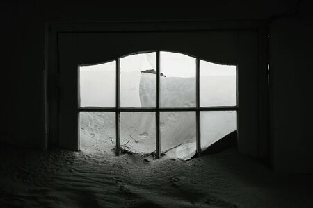 Sand has invaded and taken over this houseの写真素材