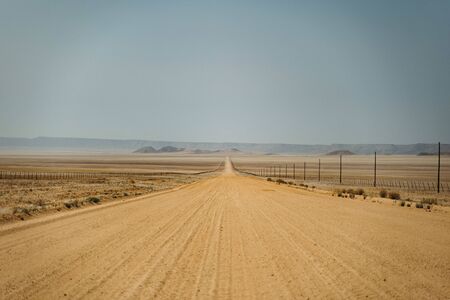 wideangel Dirty road with desert sand, Helmeringhausen, Karas, Namibia Africaの写真素材