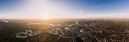panorama drone photo of the old city Treptow-Kopenick Berlin at sunriseの写真素材