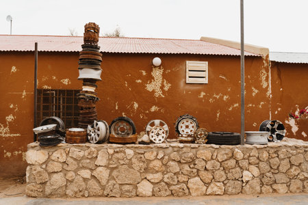 ouside old abandoned car workshop with rusty toolsの写真素材
