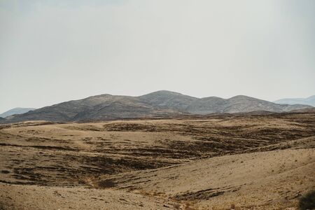 dead Moon Landscape with rocks, stones and mountainsの写真素材