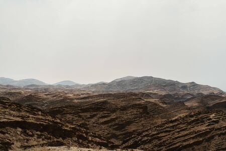 dead Moon Landscape with rocks, stones and mountainsの写真素材