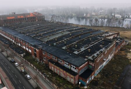 abandoned old industrial building in foggy cloudy wheaterの写真素材