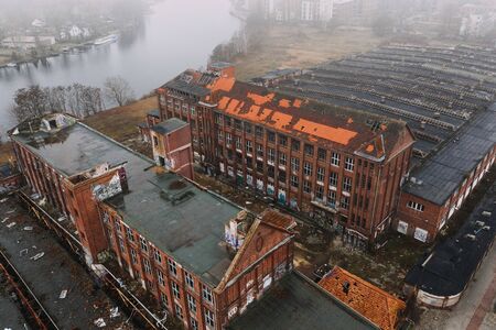 abandoned old industrial building in foggy cloudy wheaterの写真素材