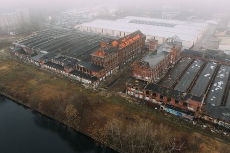 abandoned old industrial building in foggy cloudy wheaterの写真素材