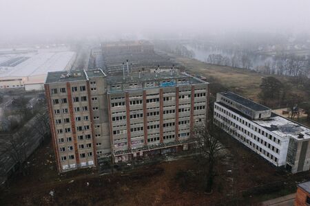 abandoned old industrial building in foggy cloudy wheaterの写真素材