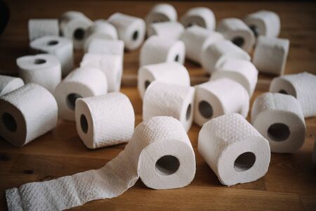 Staged stack of white tissue toilet paper rollsの写真素材