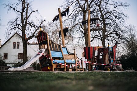 a closed playground where children are not allowed to play anymoreの写真素材