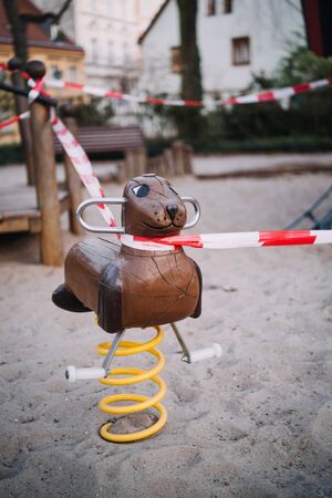 a closed playground where children are not allowed to play anymoreの写真素材