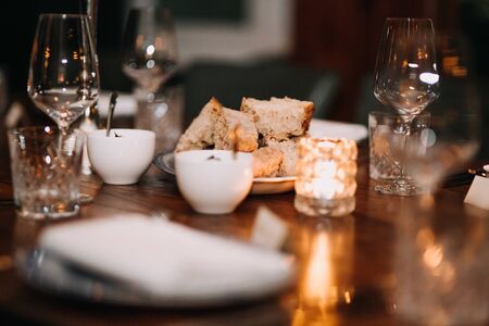 decoration on restaurant table with bread and blurry backgroundの写真素材