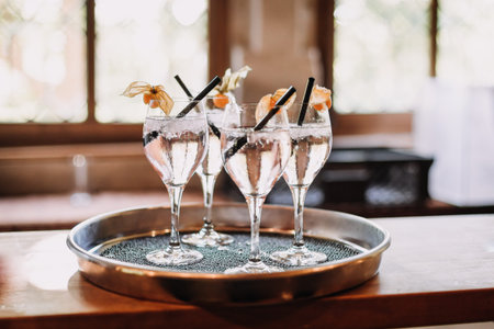 champagne glasses with sparkling spritzer at summer wedding party