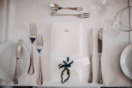 photo of knives and forks setted on a tableの写真素材