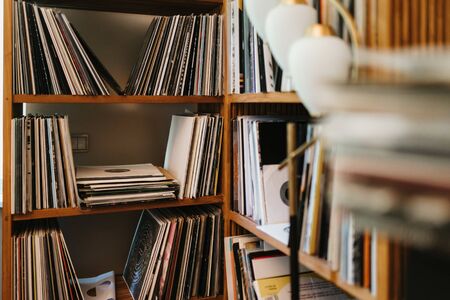 photo of a vinyls library with a lampの写真素材