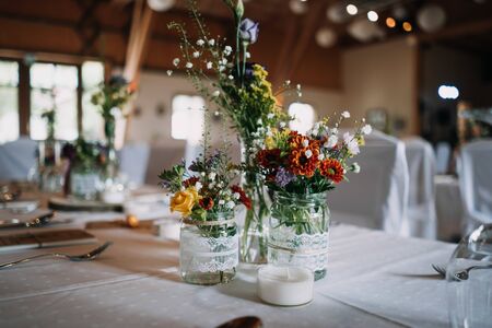 photo of empty wedding hall and empty tablesの写真素材