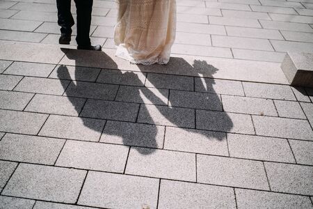 photo of married couples shadow on the streetの写真素材