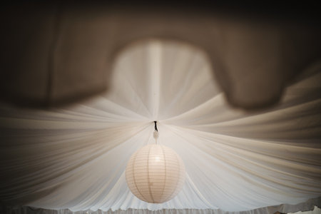 photo of a paper light in the ceiling
