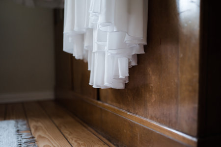 wedding dress for mother hanged on a closet