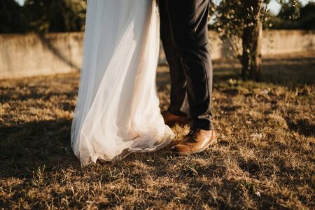 a married couple standing in a forestの写真素材