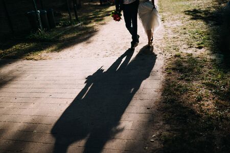 a married couples feet walkingの写真素材