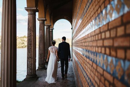 a bride and a groom in an old buildingの写真素材