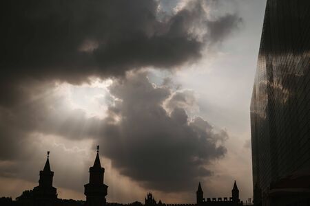the sky between the city buildingsの写真素材