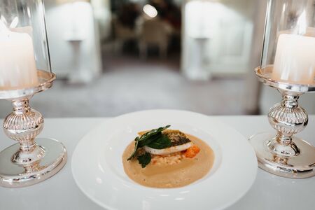 luxury artistic dish in a restaurantの写真素材