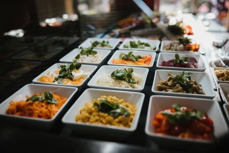an open buffet small platesの写真素材