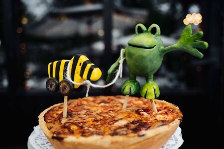 a pie with a cartoon topperの写真素材