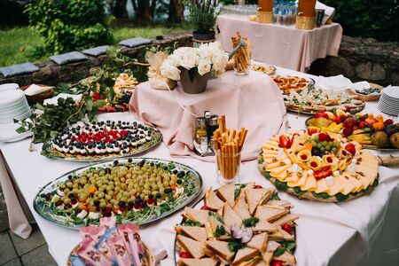 finger food and bread bites tableの写真素材