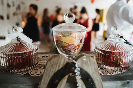candy jars on a table in a partyの写真素材