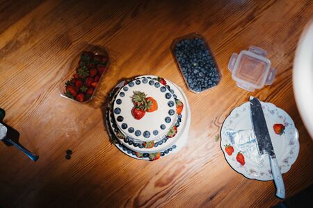 a white home made berries cakeの写真素材