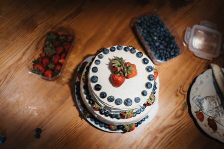 a white home made berries cakeの写真素材