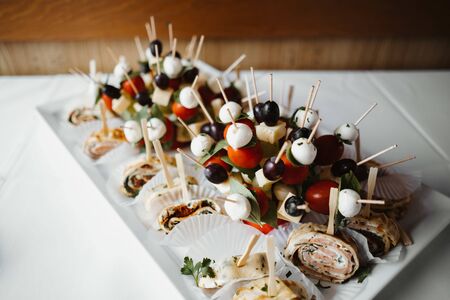 a finger food plate on a tableの写真素材