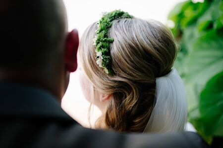 a brides hair style in the gardenの写真素材