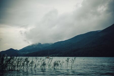a landscape of a lake with mountainsの写真素材