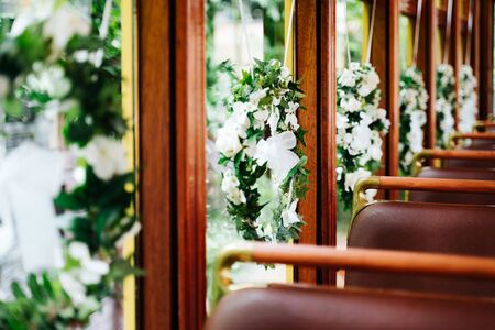 an old wedding tram with flowersの写真素材