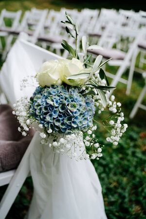 an empty wedding chairs in the gardenの写真素材