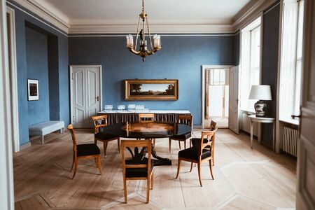 a dinning table in an old houseの写真素材