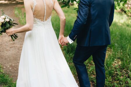 a married couple walking in the forestの写真素材