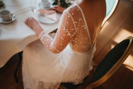 a bride sitting on a chairの写真素材